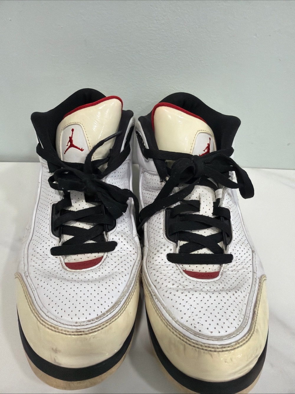 Jordan Men’s White Black Red Perforated Leather Sneakers